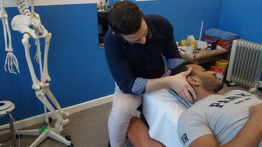 Brighton Chiropractor performing a treatment