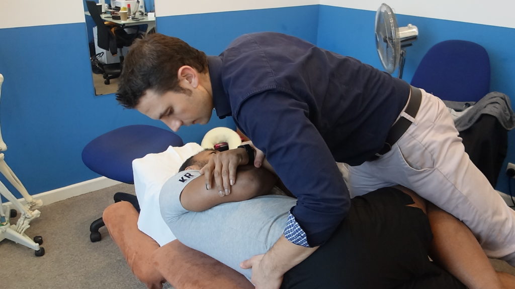 Brighton Chiropractor performing a treatment