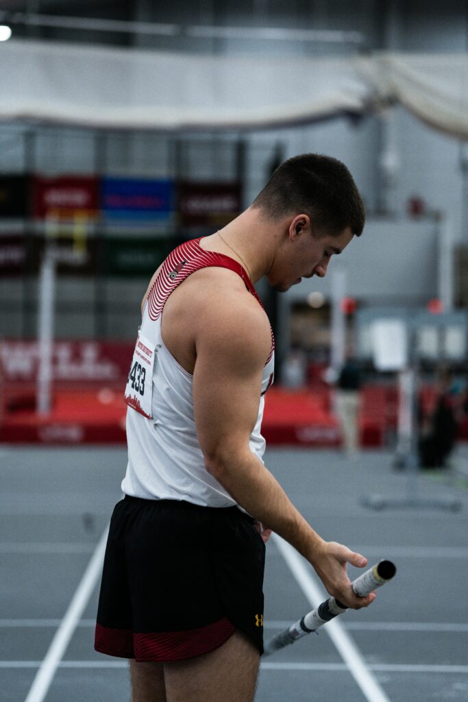 Athlete preparing to perform pole vault